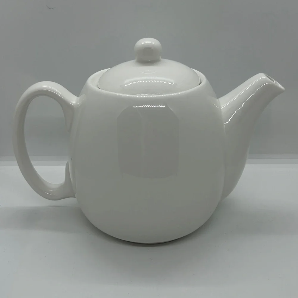 Designpac, Inc. Ceramic Blue Floral Tea Pot with Lid Melrose Park, Illinois